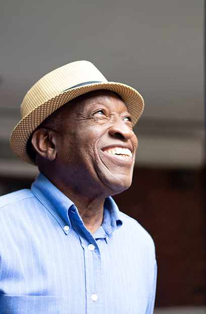 African American senior man smiling